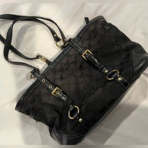 Black coach purse with buckles